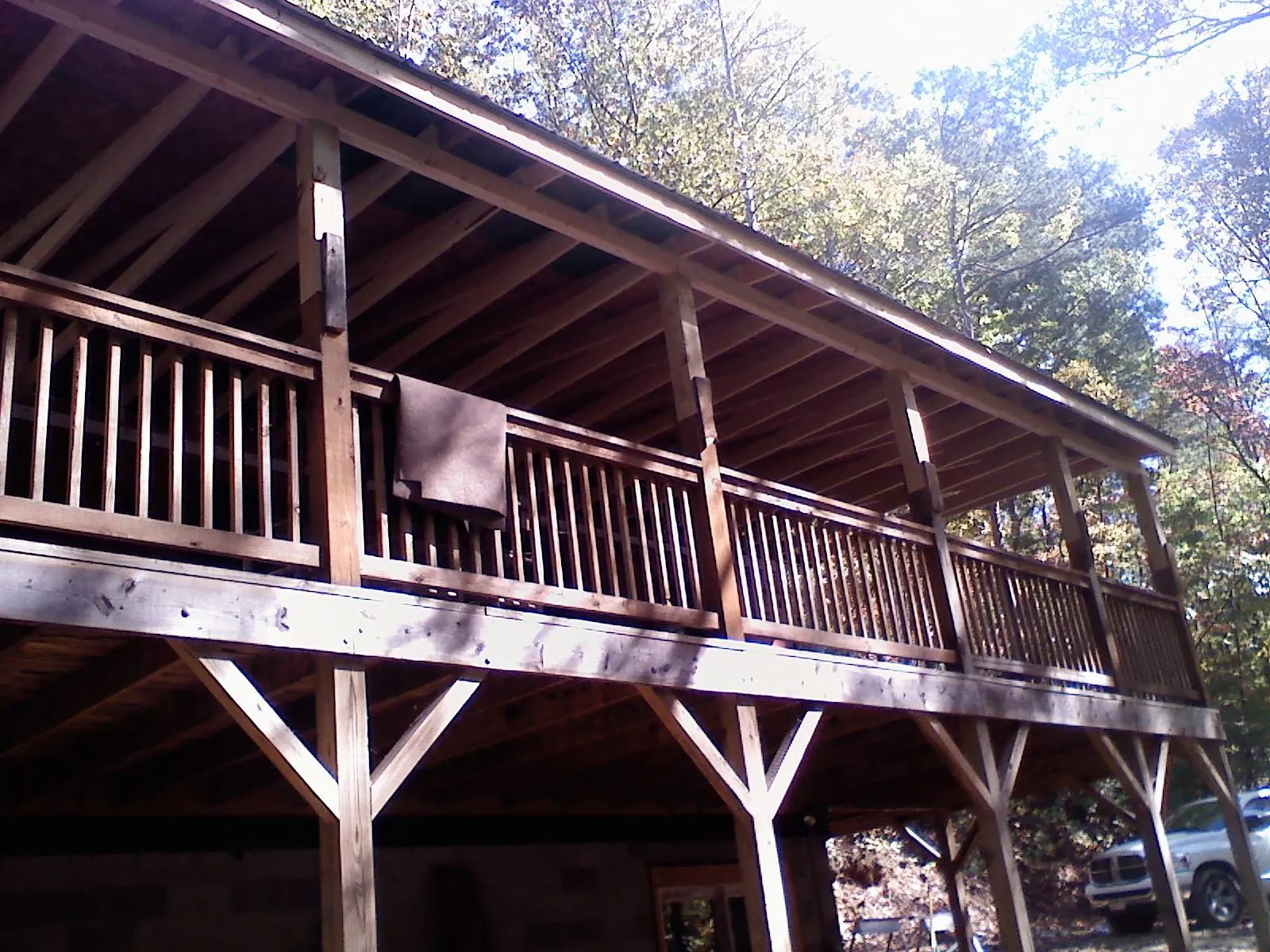 Timber framing under a new elevated porch and deck — Roof Leak Repair in Hickory Corners by Roofing Brothers